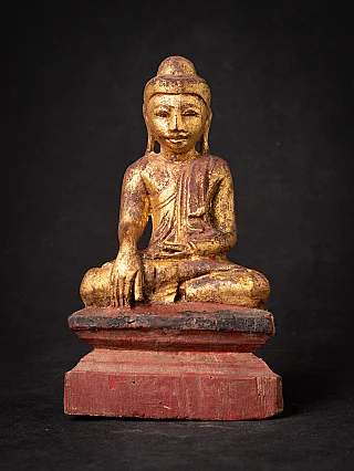 Antique wooden Burmese Buddha statue