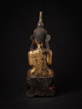 Burmese wooden Buddha statue rear view, showing back and remaining gilding