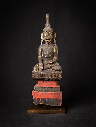 Burmese wooden Buddha statue in Shan style, seated in bhumisparsha mudra, full front view