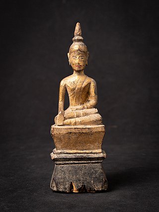 Thai wooden Buddha statue seated in bhumisparsha mudra, full front view