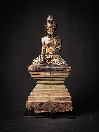 Antique wooden Shan Buddha statue from Myanmar on a tall stepped base, full front view