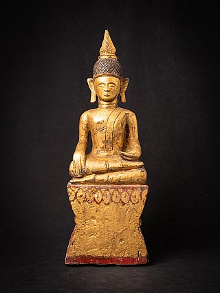 Wooden Tai Lue Buddha statue from Laos, seated in bhumisparsha mudra, full-front view