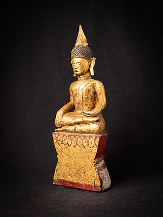 Tai Lue Buddha statue from Laos in wood with gilded surface, three-quarter right view