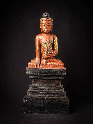 Burmese Shan Buddha statue in wood, seated on tall black lacquered base, full front view