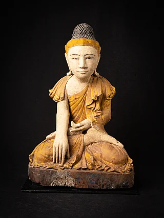 Wooden Burmese Buddha statue seated in bhumisparsha mudra, full front view