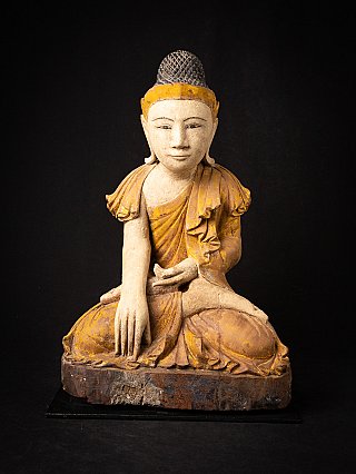 Wooden Burmese Buddha statue seated in bhumisparsha mudra, full front view