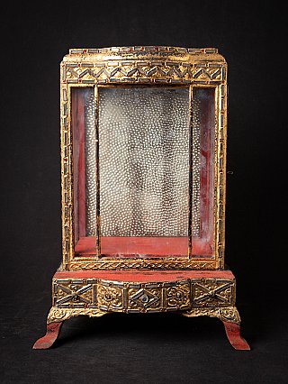 Antique wooden Burmese Buddha shrine, Mandalay period, front view with glass panels