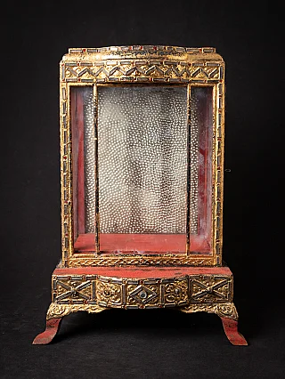Antique wooden Burmese Buddha shrine, Mandalay period, front view with glass panels