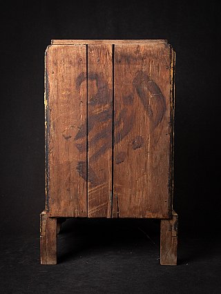 Antique wooden Burmese Buddha shrine, rear view showing the plain wooden back panel