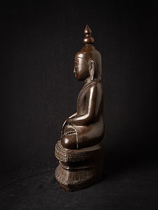 Burmese Shan Buddha statue in bronze, left side profile with elongated earlobe
