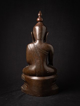 Bronze Burmese Buddha statue, rear view showing robe lines across the back and base