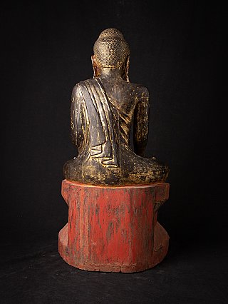 Shan wooden Buddha statue from Myanmar, rear view with robe folds and red painted base