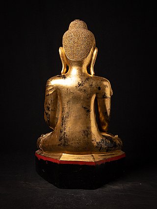 Rear view of Shan Burmese Buddha statue in lacquerware, showing wear on back and base