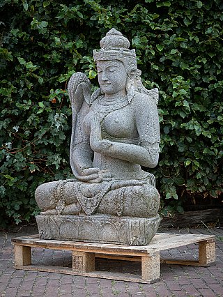 Dewi Sri lavastone statue, three-quarter view showing crown and jewellery