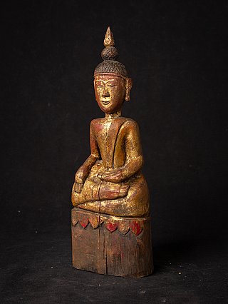 Antique wooden Thai Buddha statue