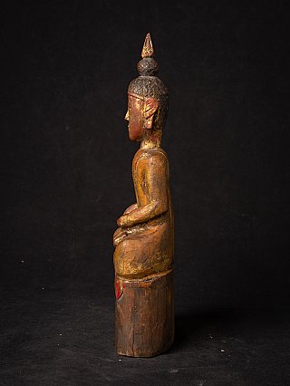Antique wooden Thai Buddha statue