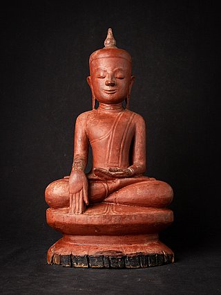 Antique wooden Burmese Buddha statue, seated in bhumisparsha mudra, full front view