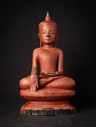 Antique wooden Burmese Buddha statue, seated in bhumisparsha mudra, full front view
