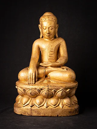 Burmese wooden Buddha statue on lotus base, seated in bhumisparsha mudra, full front view