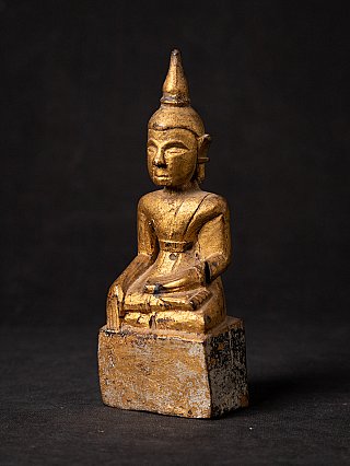 Antique wooden Thai Buddha statue