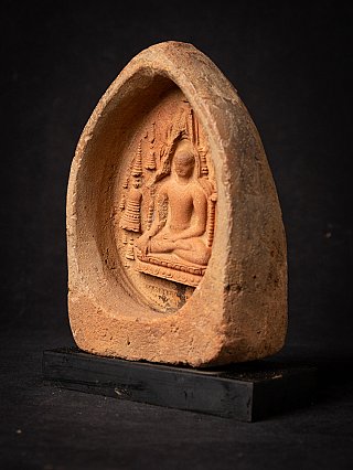 Votive tablet with Buddha relief, three-quarter view showing the niche depth and rim