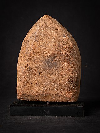 Rear view of the votive tablet from Burma (Myanmar) showing surface wear and patina