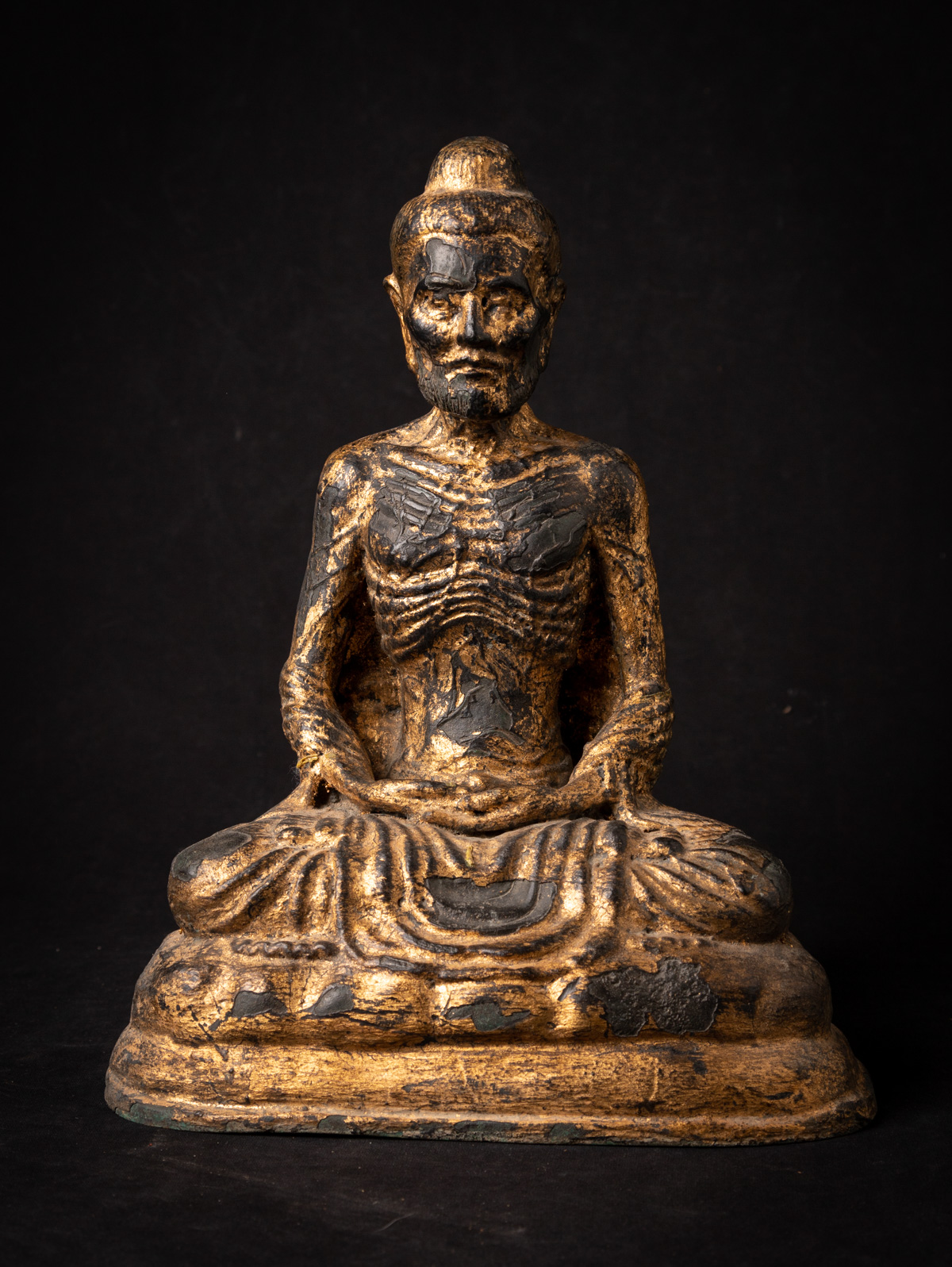 Antique bronze fasting Buddha statue from Thailand