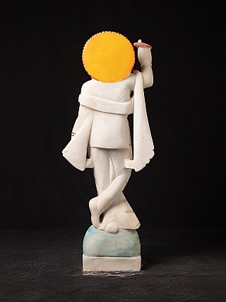 Marble Vishnu statue from India, rear view with crossed legs and circular halo