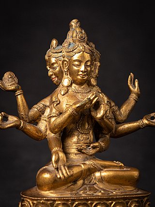 Close-up of Tibetan bronze Namgyälma showing upper body, jewellery and multiple arms