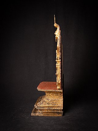 Antique wooden Buddha throne, side profile showing seat board and tall back panel