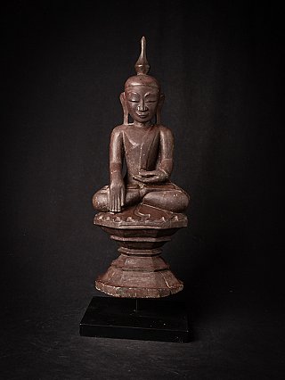 Wooden Burmese Buddha statue seated in bhumisparsha mudra, full front view