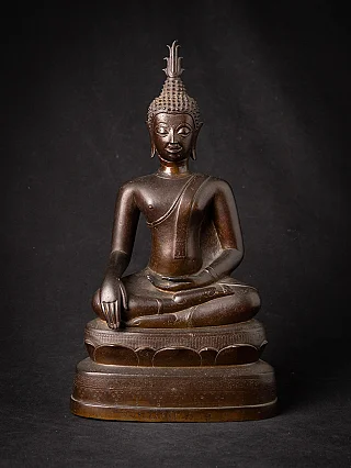 Thai bronze Buddha statue seated on pedestal, full front view in bhumisparsha mudra
