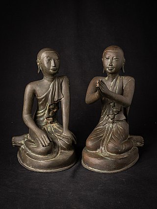 Pair of Burmese bronze monk statues, seated, one with namaskara mudra, front view
