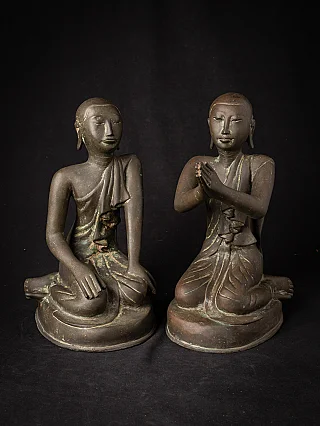 Pair of Burmese bronze monk statues, seated, one with namaskara mudra, front view