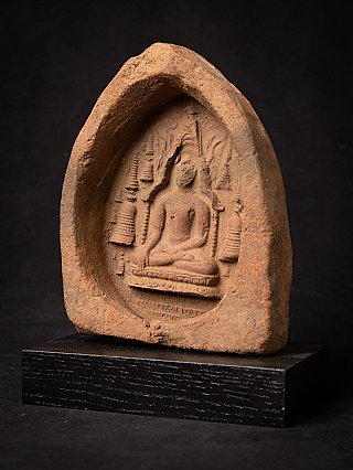 Myanmar votive tablet showing a seated Buddha relief, three-quarter left view