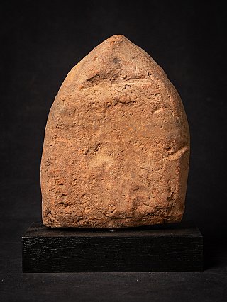 Rear view of the Bagan votive tablet from Burma showing the rough, worn surface