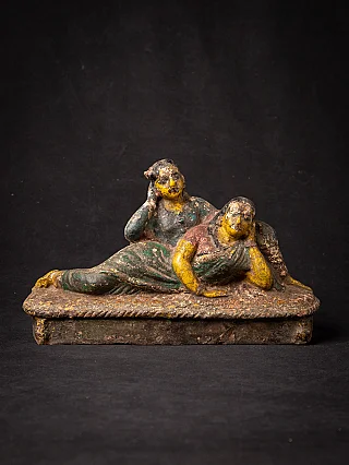Antique pottery Radha and Krishna statue from India