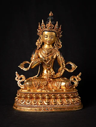 Vajrasattva statue in Nepali bronze with gold-coloured face, seated on ornate base, front view