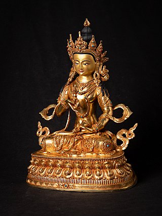 Vajrasattva statue from Nepal in bronze, seated with crown and jewellery, three-quarter view