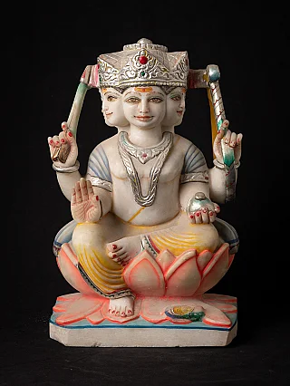 Kartik marble statue from India seated on a lotus base, full front view