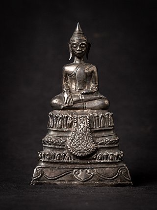 Thai wooden Buddha statue in bhumisparsha mudra, seated on ornate base, full front
