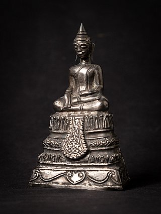 Thai wooden Buddha statue in bhumisparsha mudra, three-quarter left view
