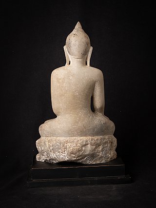 Burmese marble Buddha statue, rear view showing the rougher stone at the lower back