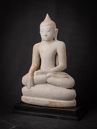 Marble Buddha statue from Burma (Myanmar), three-quarter view with bhumisparsha mudra