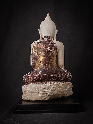 Marble Buddha statue from Burma (Myanmar), rear view showing dark patina on robe