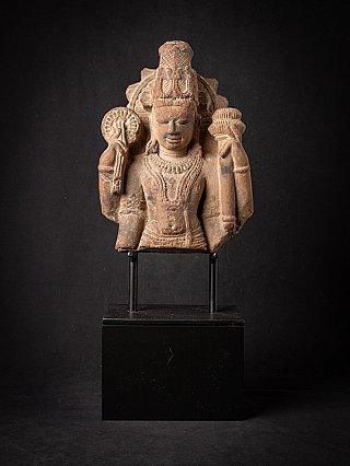 Vishnu bust from India in stone, full front view on black stand