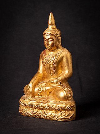 Antique gilded Burmese Buddha statue