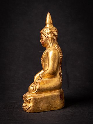 Antique gilded Burmese Buddha statue
