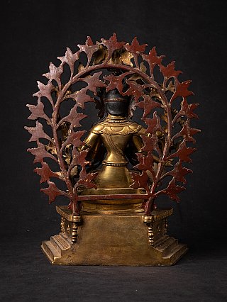 Bronze Manjushri statue from Nepal, rear view showing the openwork leaf halo