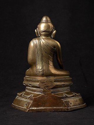 Buddha statue in bronze from Burma (Myanmar), rear view showing the back and lotus base